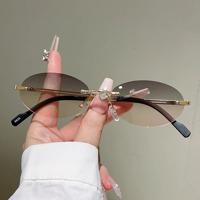 نظارات شمسية بيضاوية بدون إطار - مراجعة Designer Sunglasses وسعره